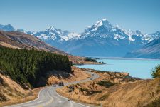 A landscape of Lake Pukaki Pukaki in New Zealand surrounded with snowy mountains